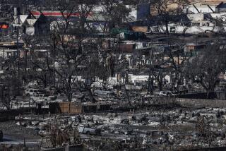 Lahaina, Maui, Wednesday, August 16, 2023 - Homes and businesses lay in ruins after last week's devastating wildfire swept through town. (Robert Gauthier/Los Angeles Times)