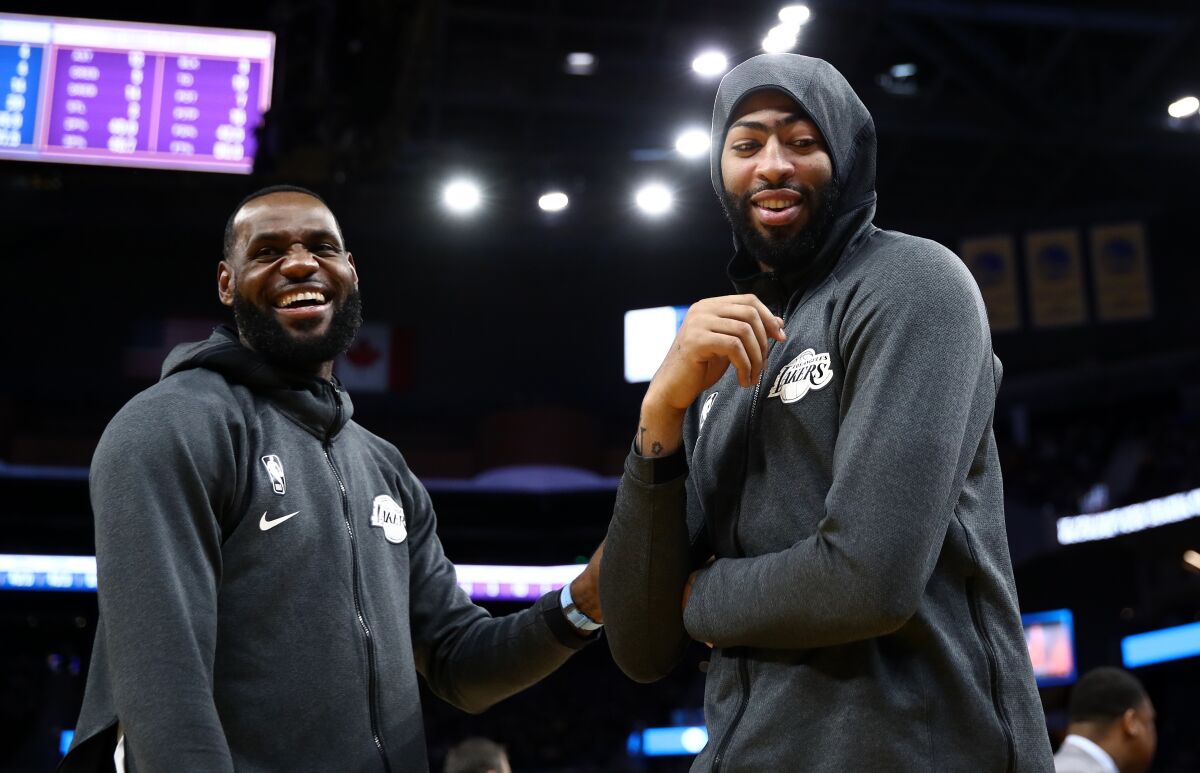 Lakers stars LeBron James, left, and Anthony Davis share a laugh.