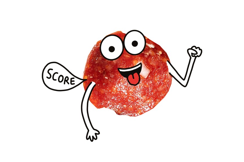 Pepperoni slices with faces drawn on