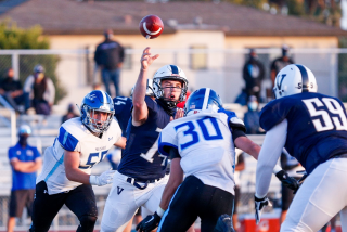 Venice quarterback Sam Vaulton throws a pass during the Gondoliers' victory over Palisades on Friday, April 9, 2021.