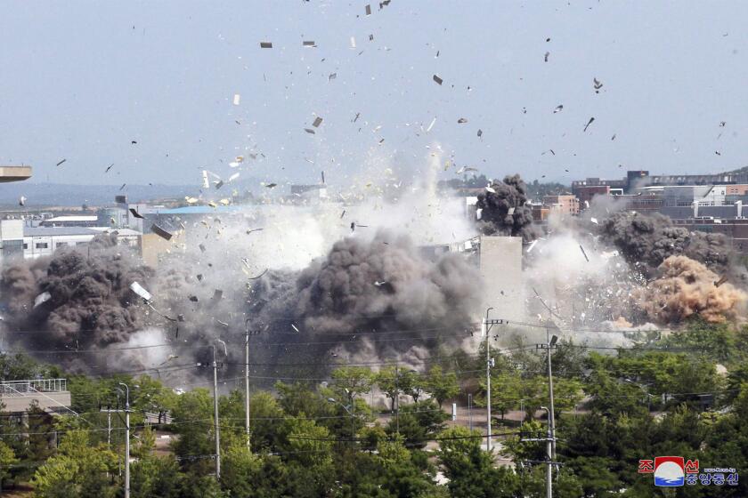 This photo provided by the North Korean government shows the explosion of an inter-Korean liaison office building in Kaesong, North Korea, Tuesday, June 16, 2020. South Korea says that North Korea has exploded the inter-Korean liaison office building just north of the tense Korean border. Independent journalists were not given access to cover the event depicted in this image distributed by the North Korean government. The content of this image is as provided and cannot be independently verified. (Korean Central News Agency/Korea News Service via AP)