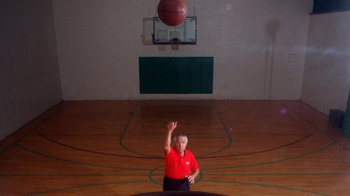 Tom Amberry practices during a morning workout in 1995.