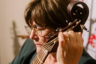 Lucy Jones with her beautiful viola da gamba.