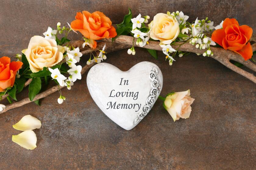 heart with in loving memory and flowers