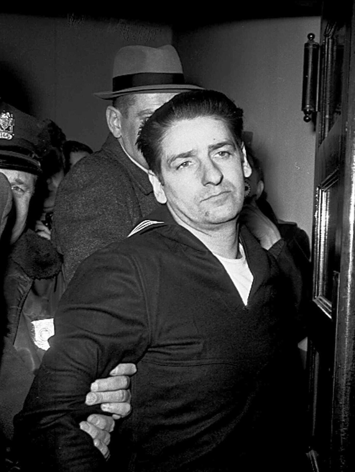Self-confessed Boston Strangler Albert DeSalvo is seen minutes after his capture in Boston in 1967. Authorities say DNA tests on the remains of DeSalvo confirm he killed Mary Sullivan, the woman believed to be the serial killer's last victim.