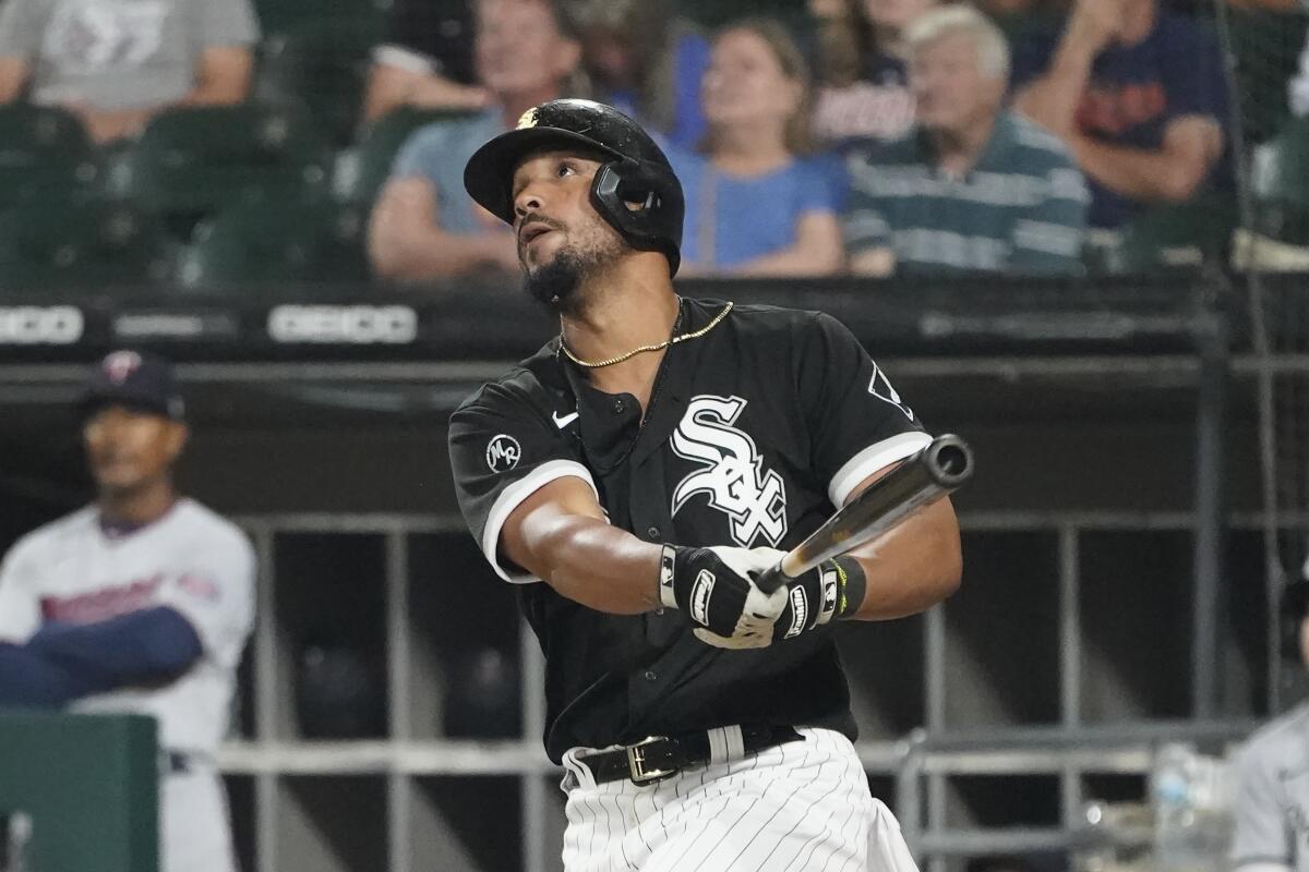 Abreu homer, triple, double, White Sox rally past Twins 9-5 - The