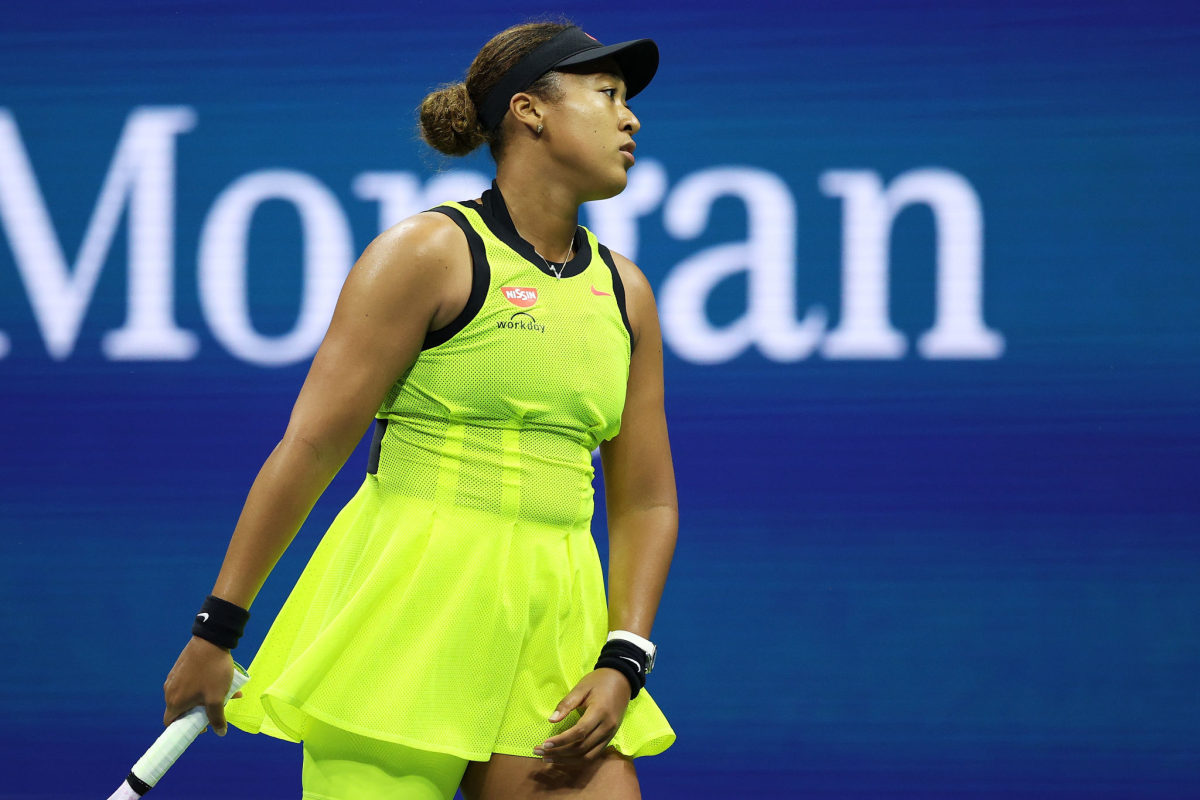 Naomi Osaka reacts during her 5-7, 7-6 (2), 6-4 loss to Leylah Fernandez in the third round of the U.S. Open.