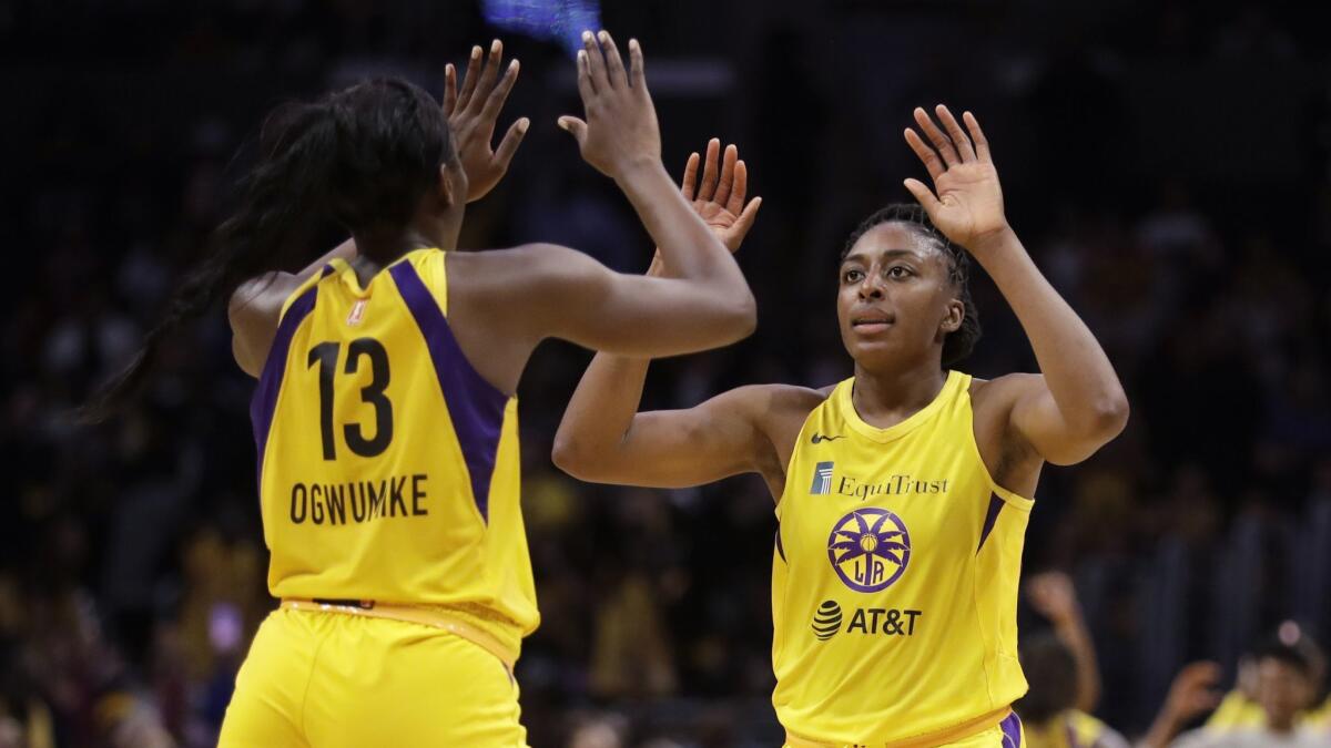 Sparks' Nneka Ogwumike, right, had 24 points, nine rebounds and five assists in the team's 78-66 win over the Atlanta Dream on Tuesday.