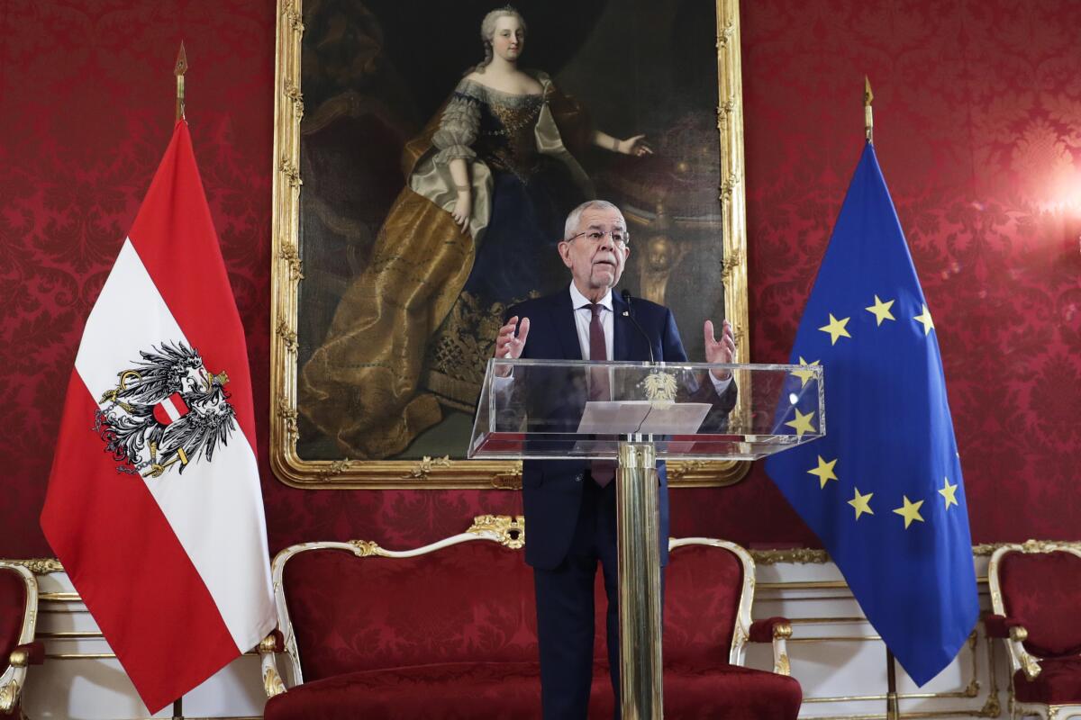 Austrian President Alexander Van der Bellen addresses holds a speech about the political situation in the country at his residence the Hofburg Palace in Vienna, Sunday, Oct. 10, 2021. The Austrian Chancellor Sebastian Kurz resigned on Saturday, October 9, to defuse a government crisis that was triggered by the announcement by the public prosecutor that he was the target of a corruption investigation. (AP Photo/Lisa Leutner)