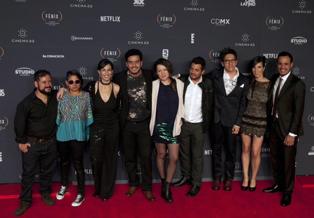 Director Jayro Bustamante, fourth from left, poses with cast and crew from "Ixcanul" at the Fenix Iberoamerican Film Awards in Mexico City in November.
