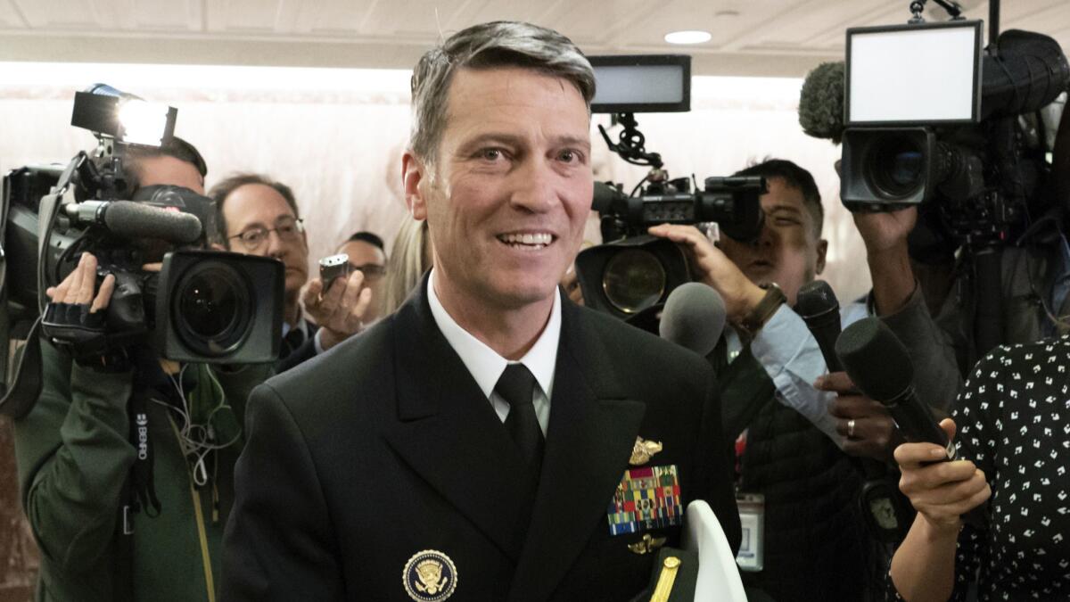 Rear Adm. Ronny Jackson leaves a Senate office building after meeting with some members of the committee that would vet him for the Department of Veterans Affairs post, on Capitol Hill in Washington on Tuesday.