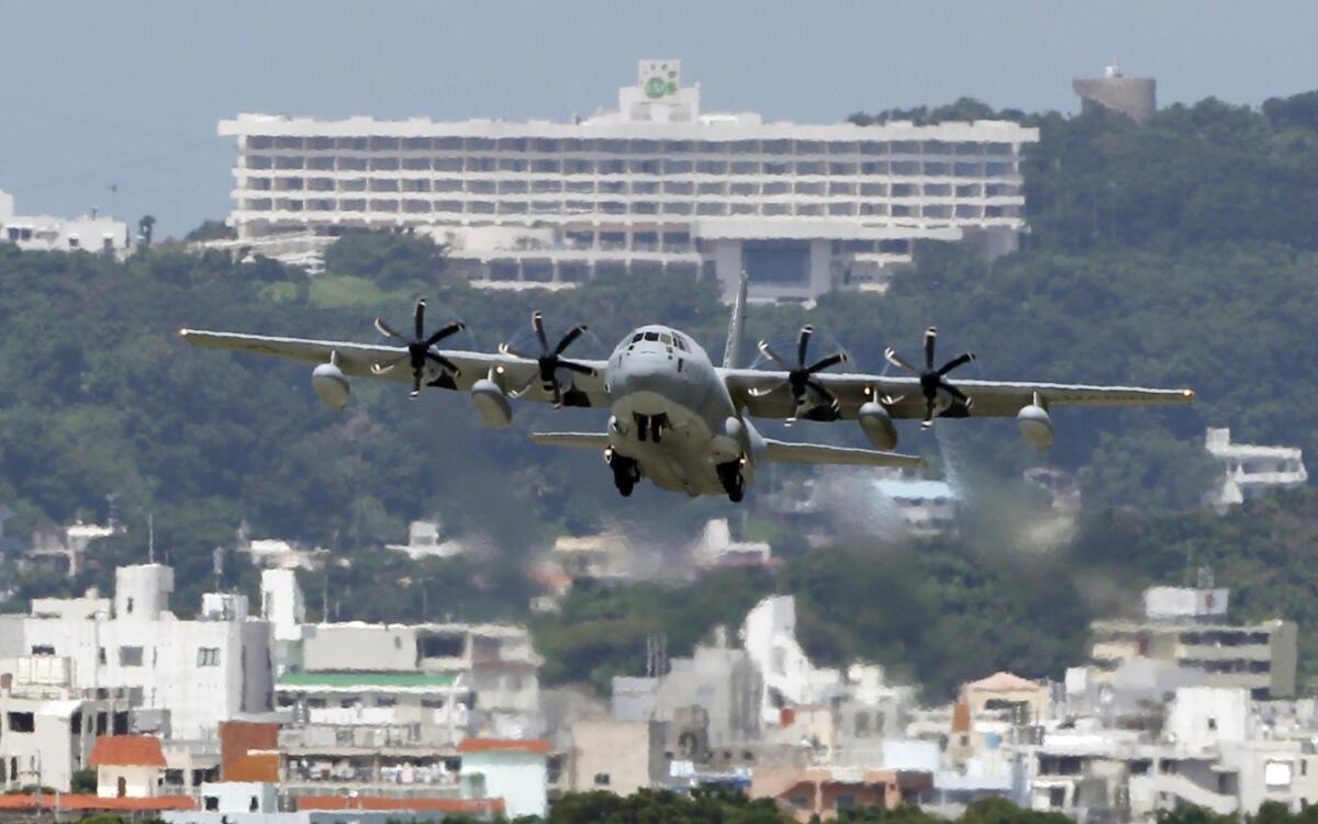 A C-130 transport plane takes off from the U.S. Marine Corps base in Okinawa, Japan.