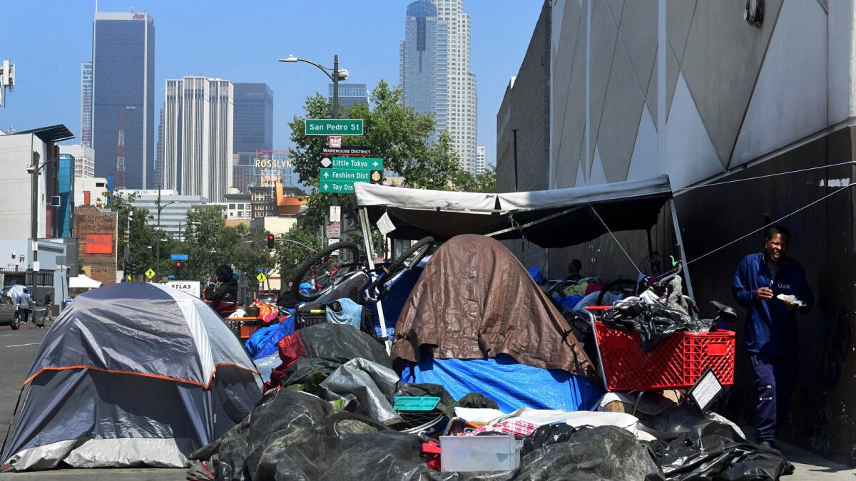 Belongings of the homeless on a skid row sidewalk in May.