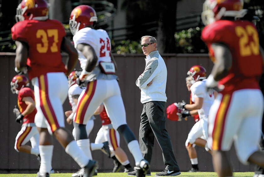 In addition to serving as USC's athletic director, Pat Haden holds more than a dozen outside roles, such as seats on corporate boards, that draw on his time.