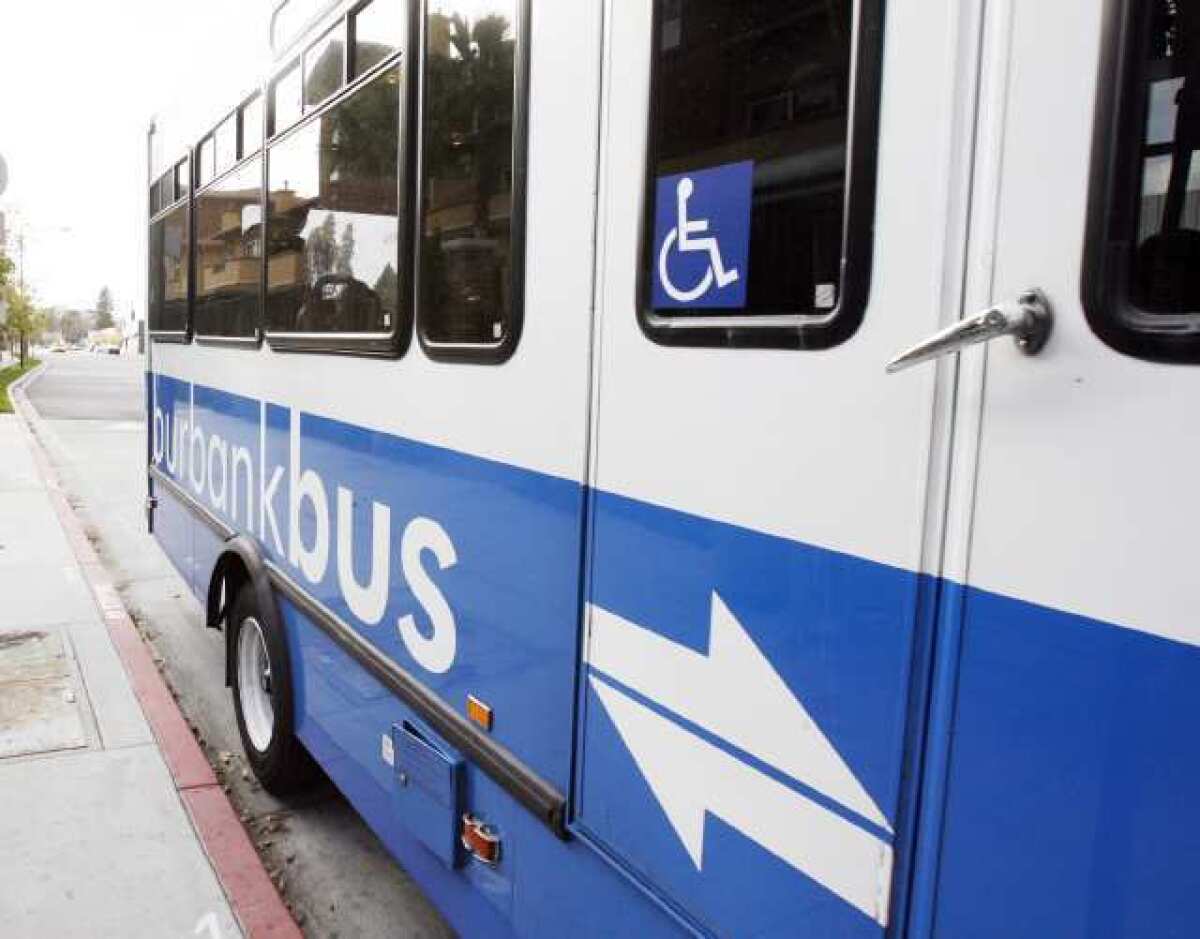 A BurbankBus arrives on Empire Avenue at Buena Vista Avenue. Officials this week discussed cutting bus services for BurbankBus Senior and Disabled Transit.