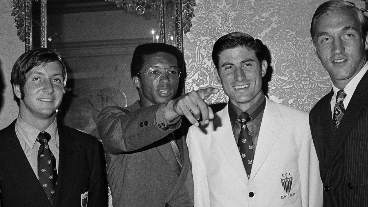 U.S. Davis Cup teammates Bob Lutz, from left, Arthur Ashe, Charles Pasarell and Stan Smith at a news conference in Washington on July 11, 1969.