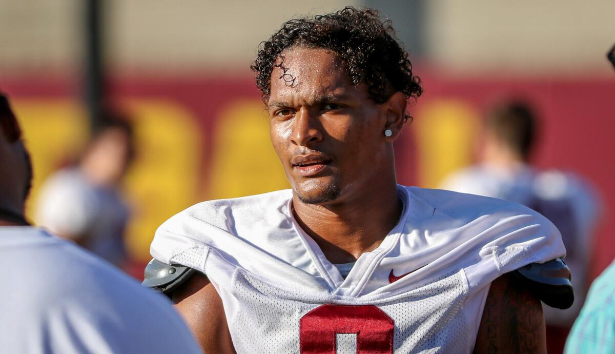 Freshman cornerback Chris Steele has a conversation after a recent USC practice.