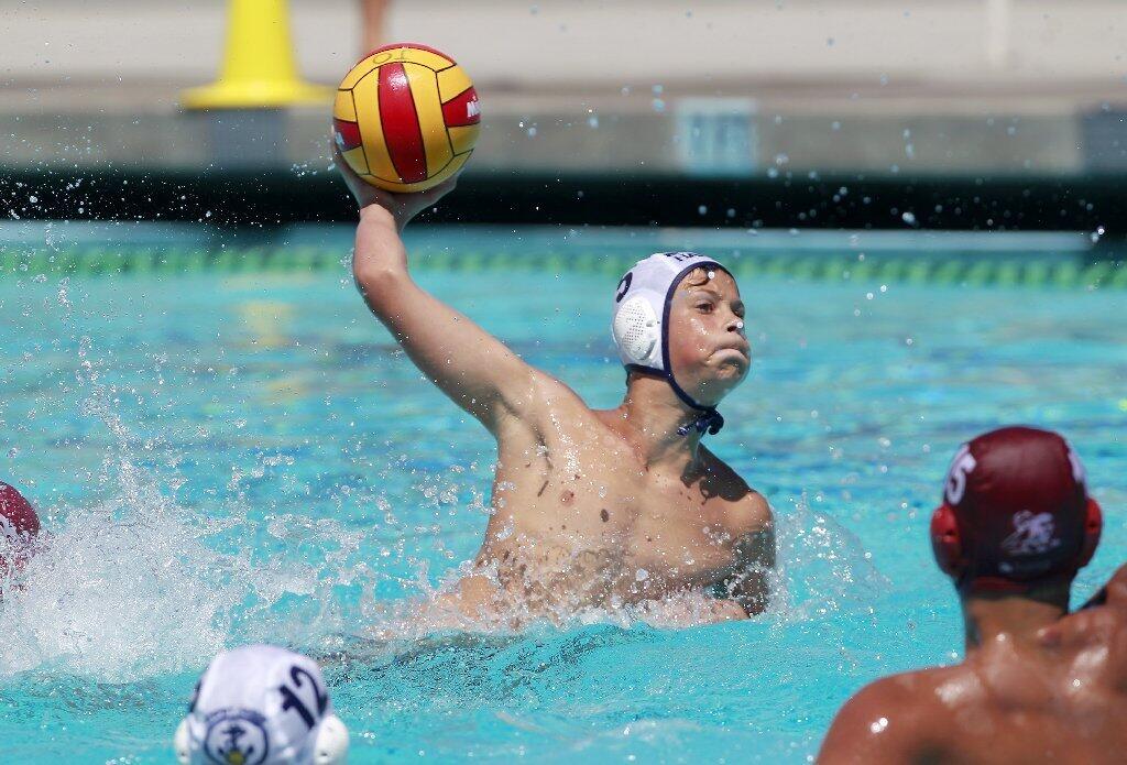 Jonathan Rimlinger of Newport Beach Water Polo competes during the first half against Trojan in the USA Junior Olympics 14U boys' bronze match at the William Woollett Aquatic Center in Irvine on Tuesday.
