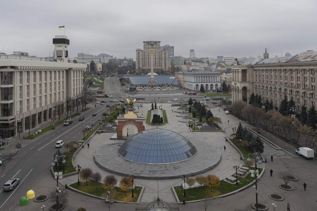 Independence Square in Kyiv, Ukraine, has buildings and streets with vehicles.