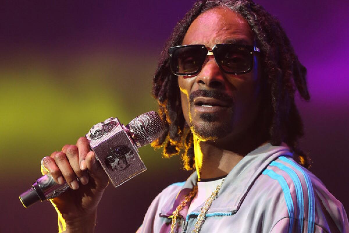 Rapper Snoop Dogg performs during the 2013 BET Experience.