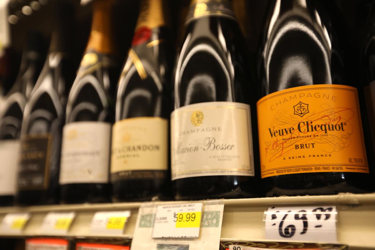 A bottle of Veuve Clicquot Champagne sells for $69.99 at Bob's Market in Santa Monica, up from $52 a month ago.