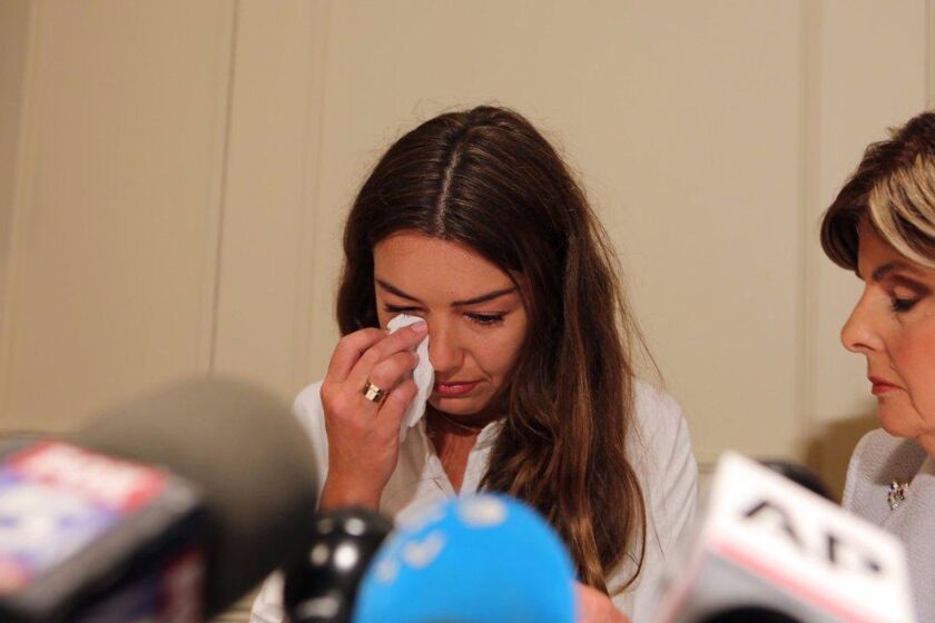 Mimi Haleyi cries at a press conference as she describes the alleged sexual abuse she claims she suffered at the hands of movie mogul Harvey Weinstein on Tuesday, Oct. 24, 2017. (Jefferson Siegel/New York Daily News/TNS) ** OUTS - ELSENT, FPG, TCN - OUTS **