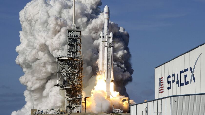 SpaceX's Falcon Heavy rocket lifts off at Kennedy Space Center in Florida on Feb. 6.