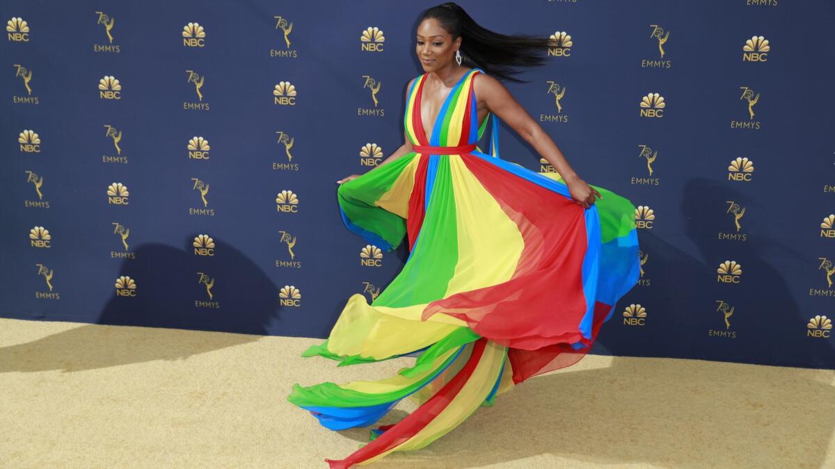 Tiffany Haddish in a Prabal Gurung gown at the 70th Primetime Emmy Awards at the Microsoft Theater in Los Angeles on Monday. She said the color scheme, which incorporated the colors of the Eritrean flag, was an homage to her father.