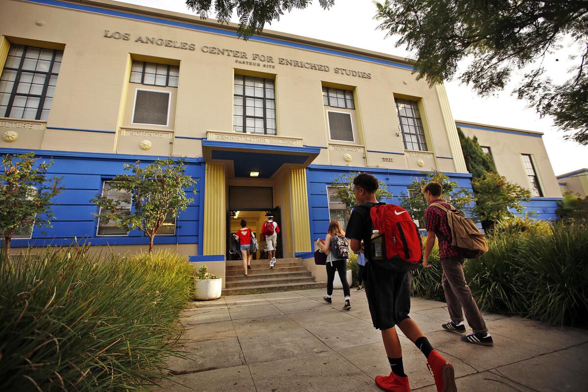 Students arrive Monday morning for classes at the Los Angeles Center for Enriched Studies, a magnet school that requires all students to take an AP class. (Al Seib / Los Angeles Times)