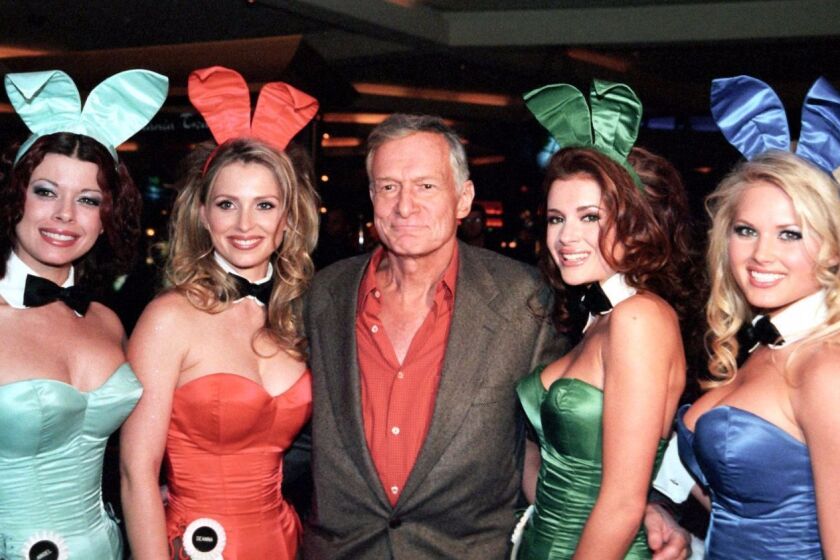MANDATORY CREDIT HANDOUT EDITORIAL USE ONLY/NO SALES Mandatory Credit: Photo by Glenn Pinkerton/LVNB/HANDOUT/EPA-EFE/REX/Shutterstock (9096355a) Barbi Benton, Hugh Hefner and Marty Robbins Playboy magazine founder Hugh Hefner dies at age 91, Las Vegas, USA - 01 Mar 2001 A handout photo made available by the Las Vegas News Bureau on 28 September 2017 shows Hugh Hefner (C) poses with Playboy bunnies at the Hard Rock Hotel in Las Vegas, Nevada, USA, 01 March 2001. According to media reports on 28 September 2017, Playboy magazine founder Hugh Hefner died of natural causes at the age of 91 at his Los Angeles home, the Playboy Mansion, on the evening of 27 September. ** Usable by LA, CT and MoD ONLY **