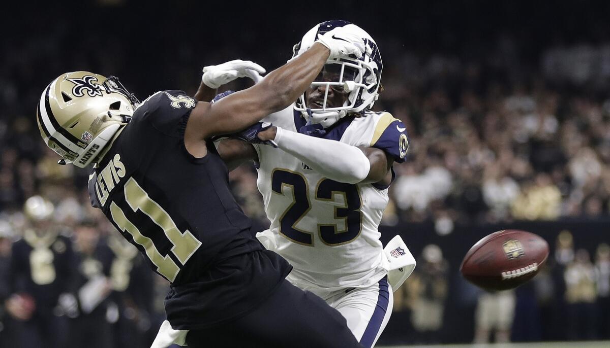Rams cornerback Nickell Robey-Coleman breaks up a pass intended for New Orleans Saints wide receiver Tommylee Lewis.