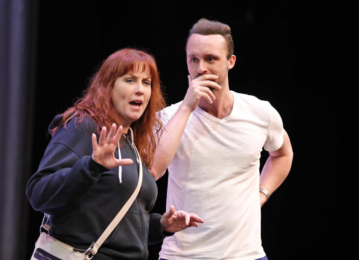 Actors Alison Nusbaum and Danny Crowe rehearse a scene for "I Love You, You're Perfect, Now Change," at Laguna Playhouse.