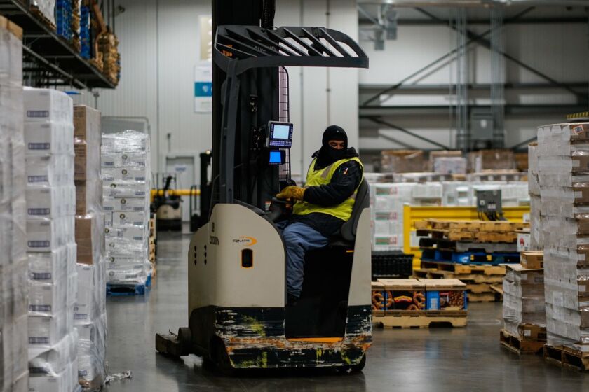 VERNON, CALIF. - JUNE 25: Workers move and store inventory at Lineage Logistics at on Tuesday, June 25, 2019 in Vernon, Calif. (Kent Nishimura / Los Angeles Times)