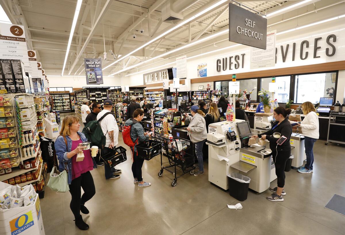 Shoppers fill the aisles in the spacious new Vons Avalon Market located on Catalina Island. (Al Seib / Los Angeles Times)