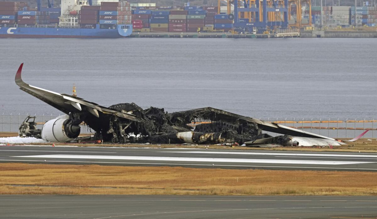 Planes collide and catch fire at Japan's busy Haneda airport, killing 5