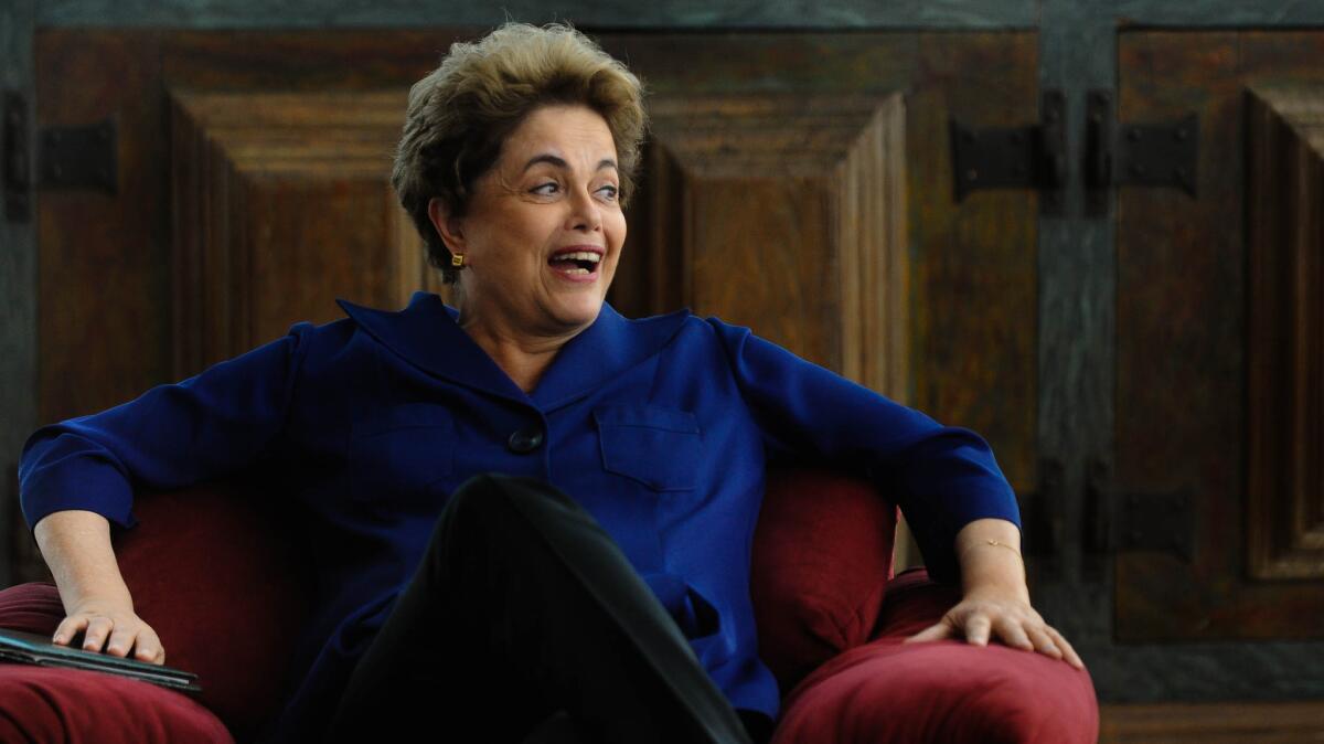 Dilma Rousseff, the suspended president of Brazil, laughs during an interview in the presidential residence.