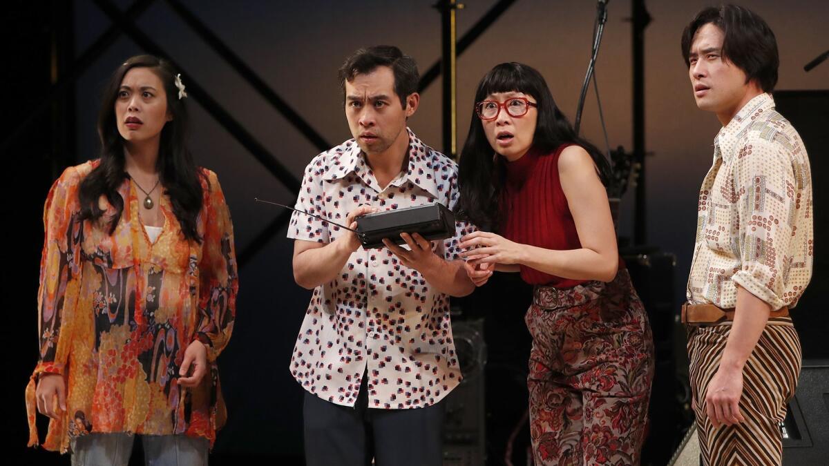 Actors Brooke Ishibashi, Joe Ngo, Jane Lui and Raymond Lee perform in “Cambodian Rock Band,” a play making its world premiere through March 25 at South Coast Repertory.