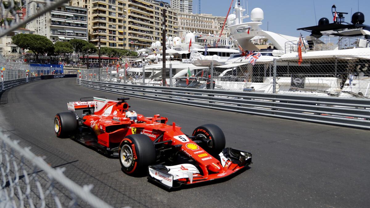 Formula One driver Sebastian Vettel steers his Ferrari through a turn during the Grand Prix of Monaco on Sunday.