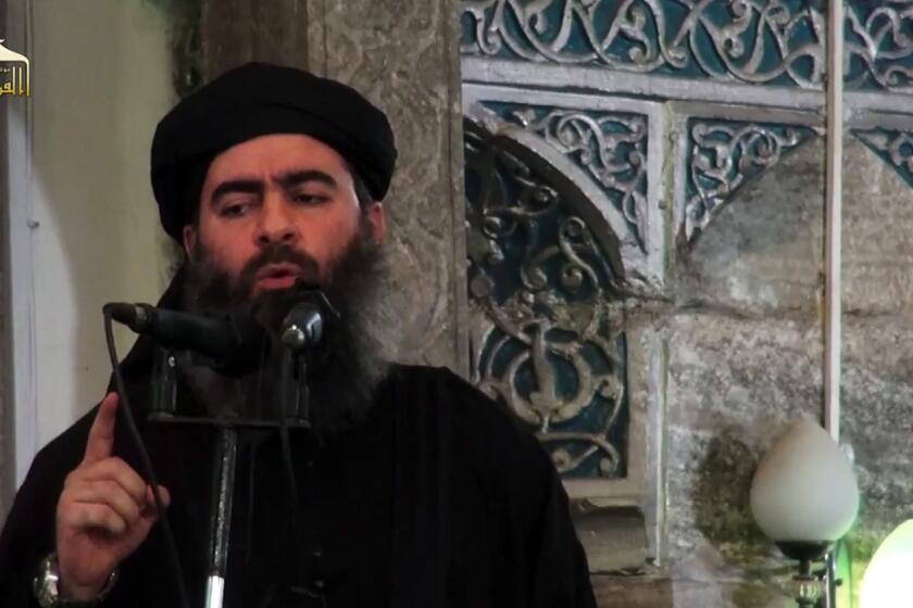 The Islamic State released a speech said to be of its leader, Abu Bakr Baghdadi. It was unclear whether the recording was made before or after airstrikes that were rumored to have killed or wounded him. Above, a video purportedly showing Baghdadi at a mosque in Mosul, Iraq, in July.