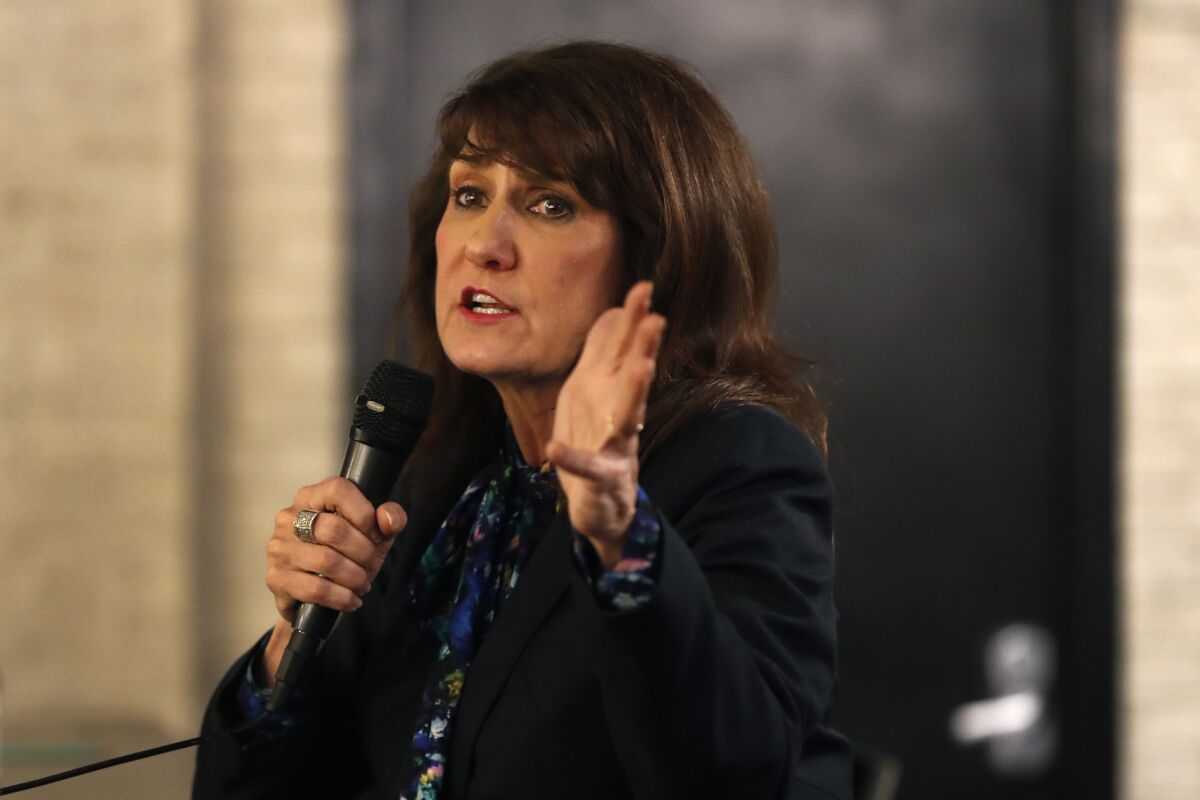 Marie Newman campaigns in a Chicago neighborhood