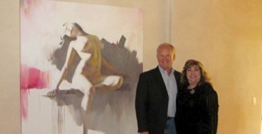 May Zawaideh and Stephen Sheedy with the Akaaby painting. Photos courtesy Marybeth Kellehee