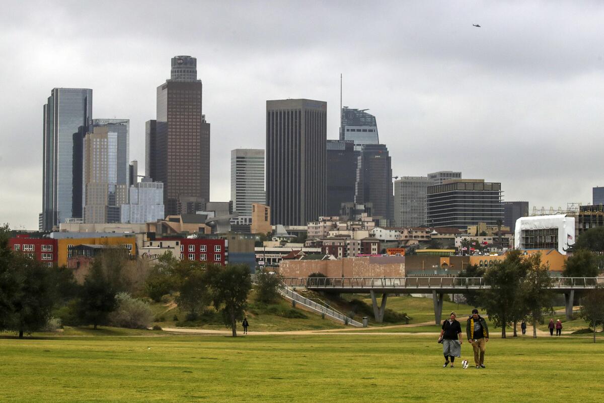 Los Angeles, CA - February 15: A view downtown skyline on a cloudy morning from Los Angeles State Historic Park on Tuesday, Feb. 15, 2022 in Los Angeles, CA. (Irfan Khan / Los Angeles Times)