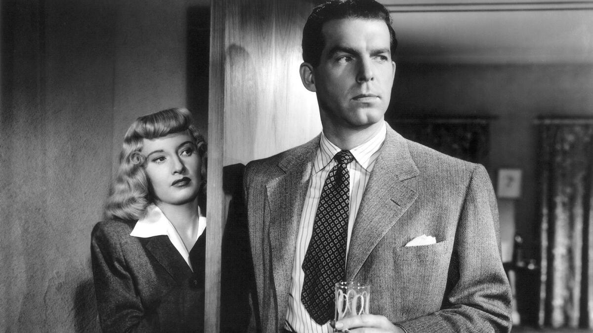 Left to right: Barbara Stanwyck and Fred MacMurray in the movie 'Double Indemnity' (1944), directed by Billy Wilder.