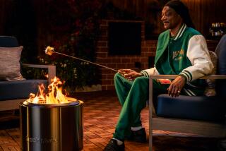 Snoop isn't giving up weed, he's 'giving up smoke' in a partnership with a smokeless fire pit company.