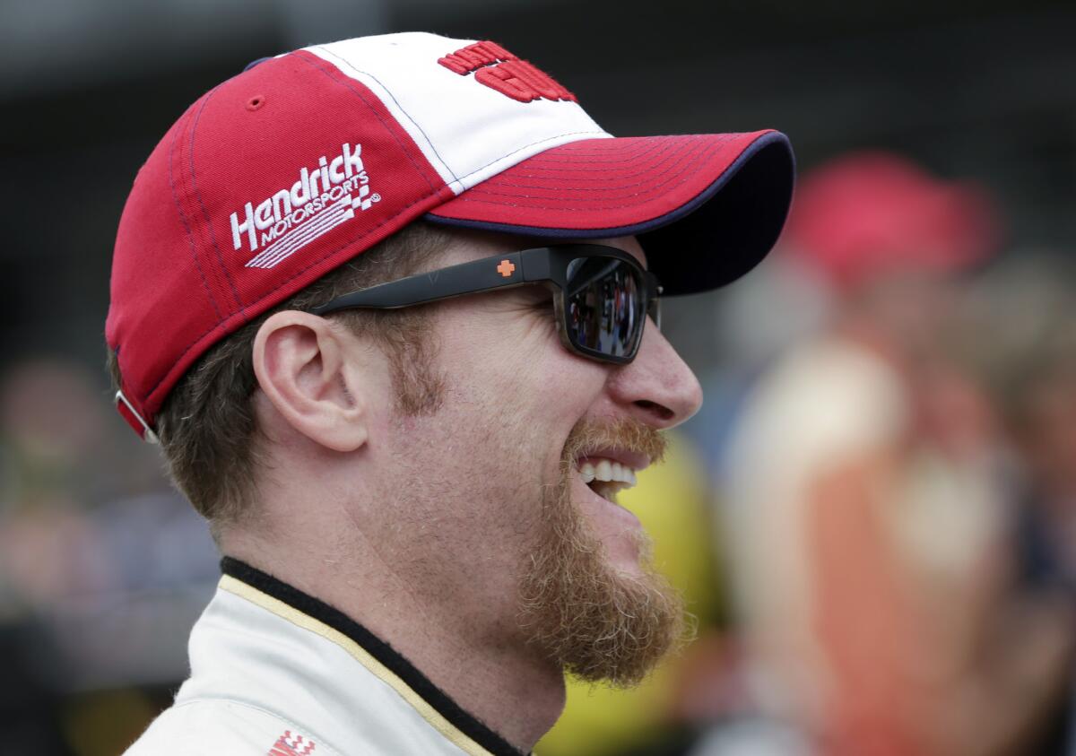 Dale Earnhardt Jr. laughs before the Brickyard 400 at the Indianapolis Motor Speedway on July 26.