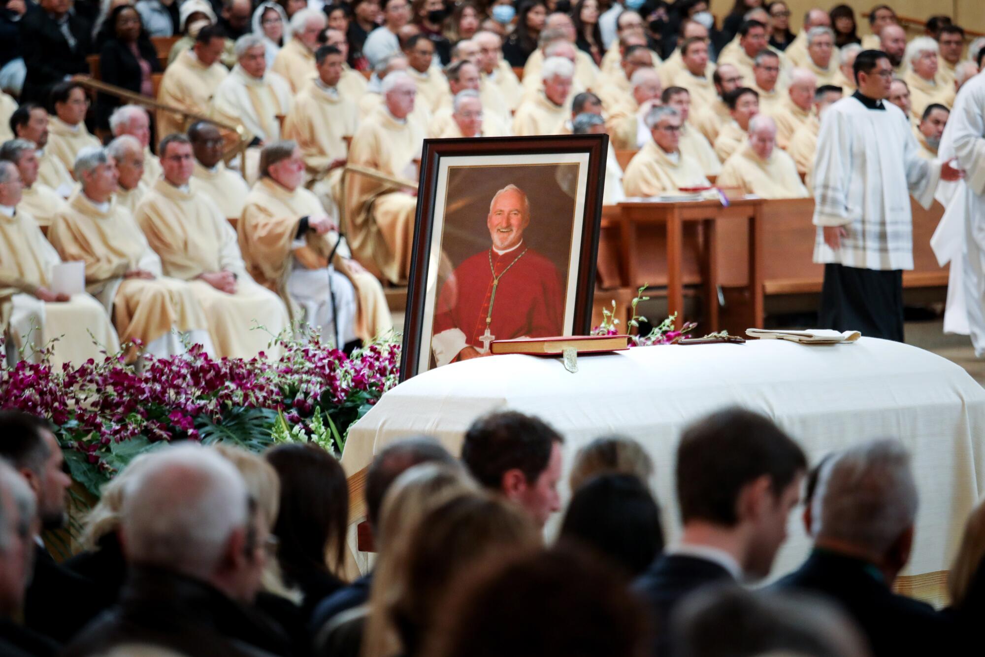 A photo of Bishop O'Connell is displayed on his coffin at his funeral Mass on Friday.