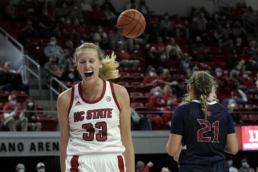 North Carolina State center Elissa Cunane (33) reacts following a basket against Saint Mary's during the first half of an NCAA college basketball game in Raleigh, N.C., Sunday, Dec. 12, 2021. (AP Photo/Gerry Broome)