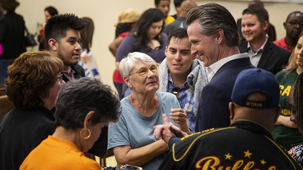 Supporters greet Democratic candidate for governor Lt. Gov. Gavin Newsom after he spoke at the UFCW Local 1167 Hall on May 25 in Bloomington, Calif.