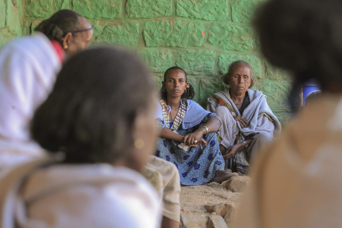 Ethiopian women gather at a community meeting in Mai Mekden, in the Tigray region of northern Ethiopia.