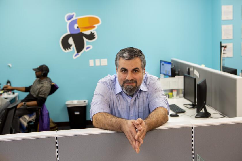 WEST HILLS, CA-JANUARY 22, 2019: Brad Basmajian, Chief Operating Officer at Toco Warranty, poses for a portrait at the Toco Warranty offices.Toco Warranty is the first major contributor to StudentPlayer.com, a newly-launched crowdfunding sponsorship website for college athletes. Toco Warranty pledged $10,000 to 10 different starting quarterback players of Division I programs. Toco is asking athletes to participate in social media advertising in exchange for the contribution. (Gabriella Angotti-Jones/Los Angeles Times)